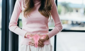 Woman hands touching virtual uterus, female reproductive system , woman health, PCOS